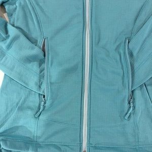 Previously worn Mountain Hard Wear Aqua Greenish Hooded Women’s Sweat Shirt.